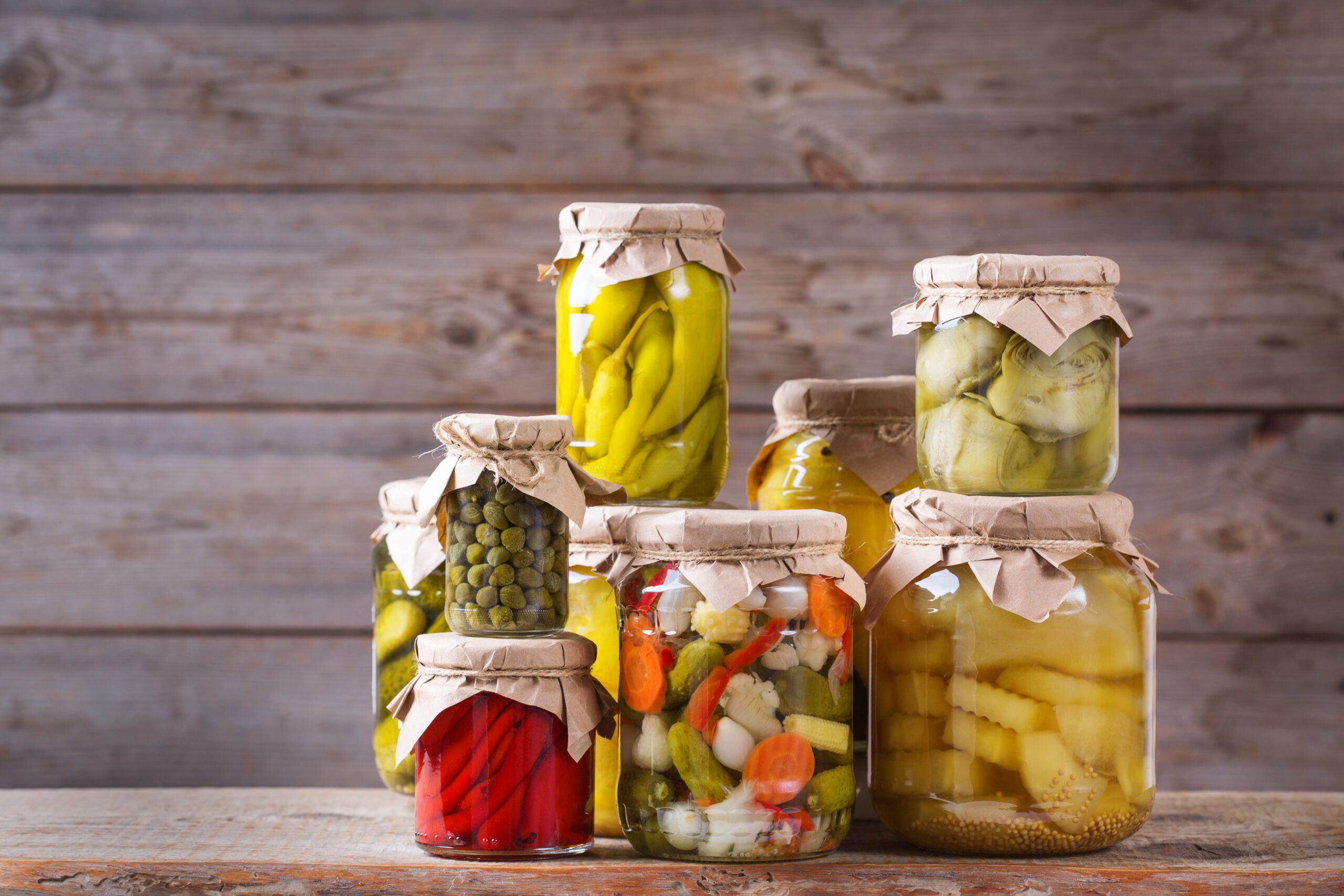 Homemade preserved and fermented food, pickled and marinated veg Large jar of dill pickles